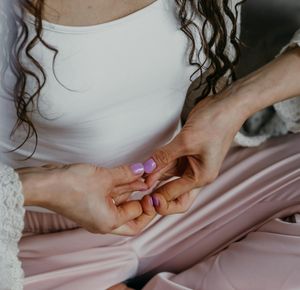 Close-up of a person practicing mindful breathing exercise.
